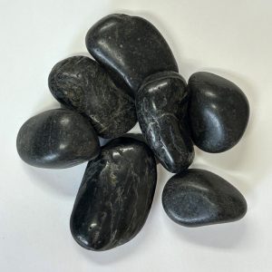 Polished Black Pebbles on display