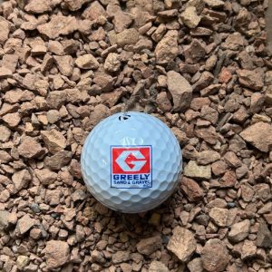 Crushed Recycled Brick with golf ball for comparison of sizing