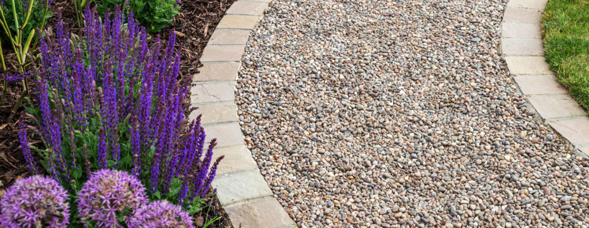 Looking for backyard gravel ideas? Explore seven weekend projects, compare gravel types, estimate costs, and choose the right gravel for your yard.